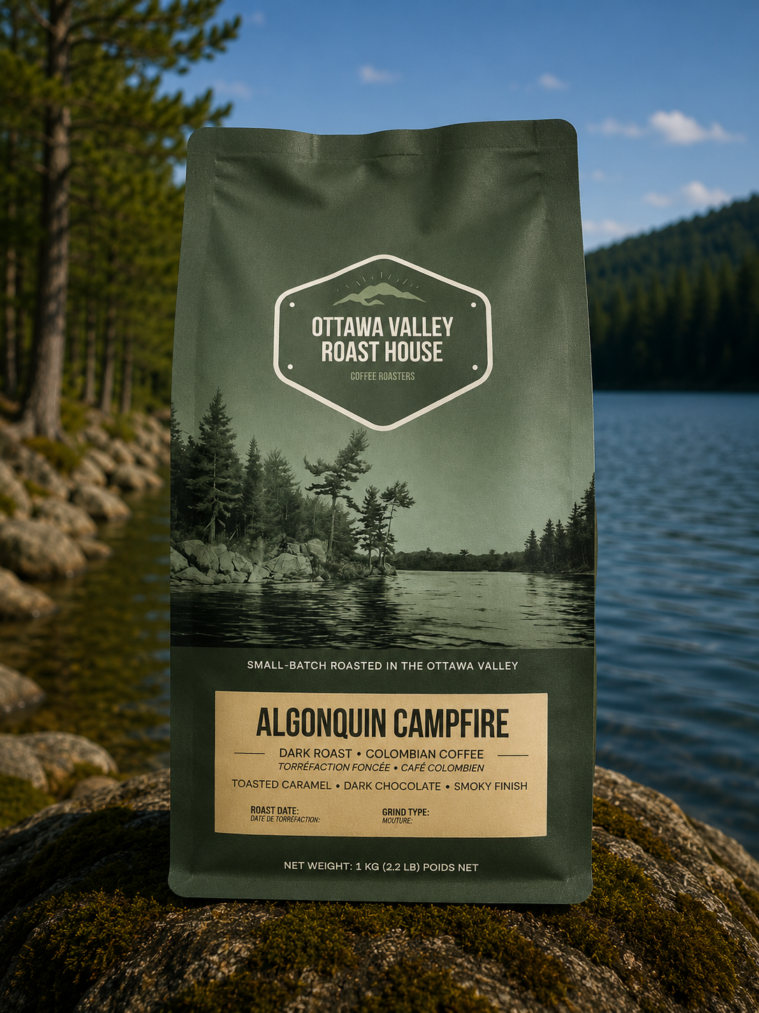 A bag of Ottawa Valley Roast House Algonquin Campfire coffee stands upright on a mossy rock with a forest and lake in the background.