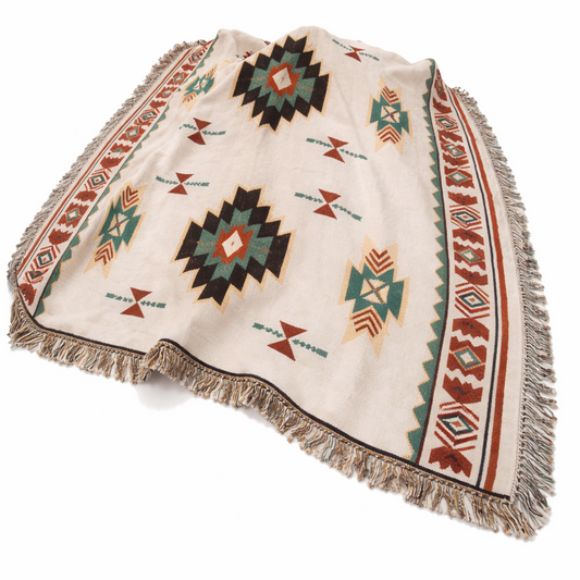 Decorative throw blanket with geometric pattern on a white background