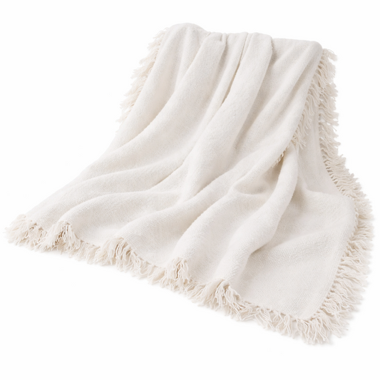 White blanket with frayed edges on a white background